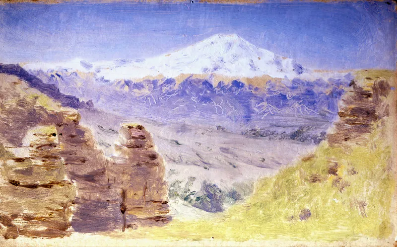 Вершины снежных гор, освещенные солнцем